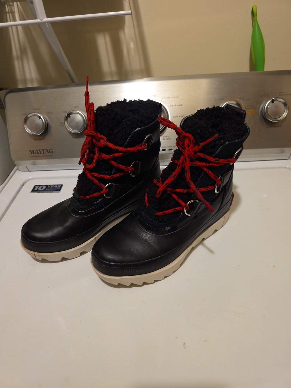 Sorel Women's Black Winter Boots with Red Laces and Cream Sole